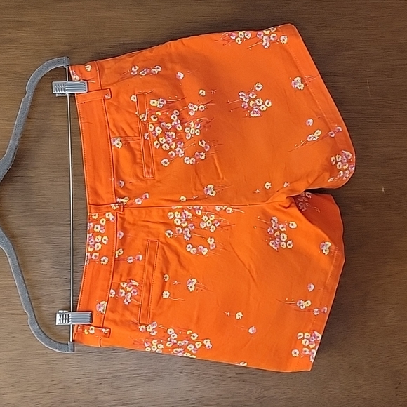 A.n.a size 6 twill short vibrant orange with pink, yellow and blue flowers. - Picture 2 of 7